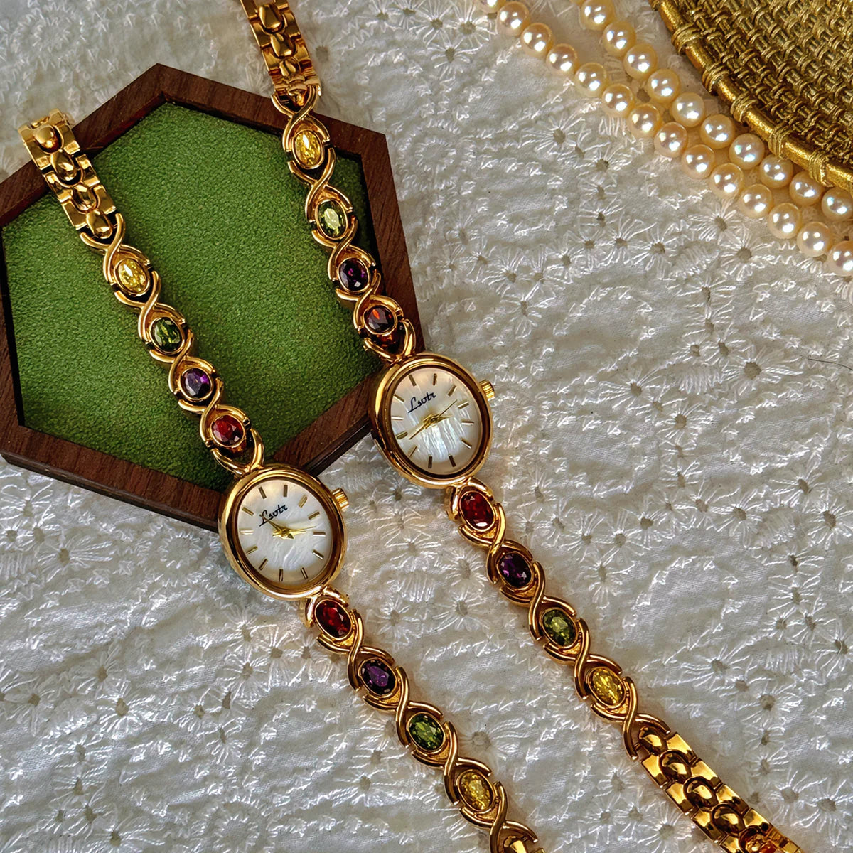 1Pc New High-End Luxury Women'S Watch Embedded with Colorful Tourmalines, Diamonds and an Oval Shaped Mother of Pearl Dial.