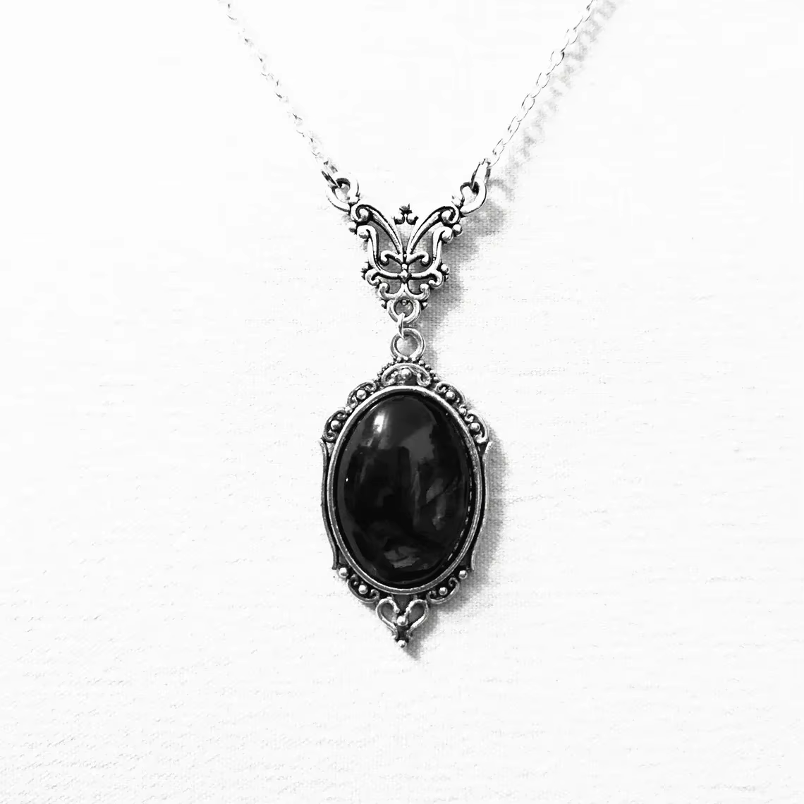 The Widow’s Charm Necklace