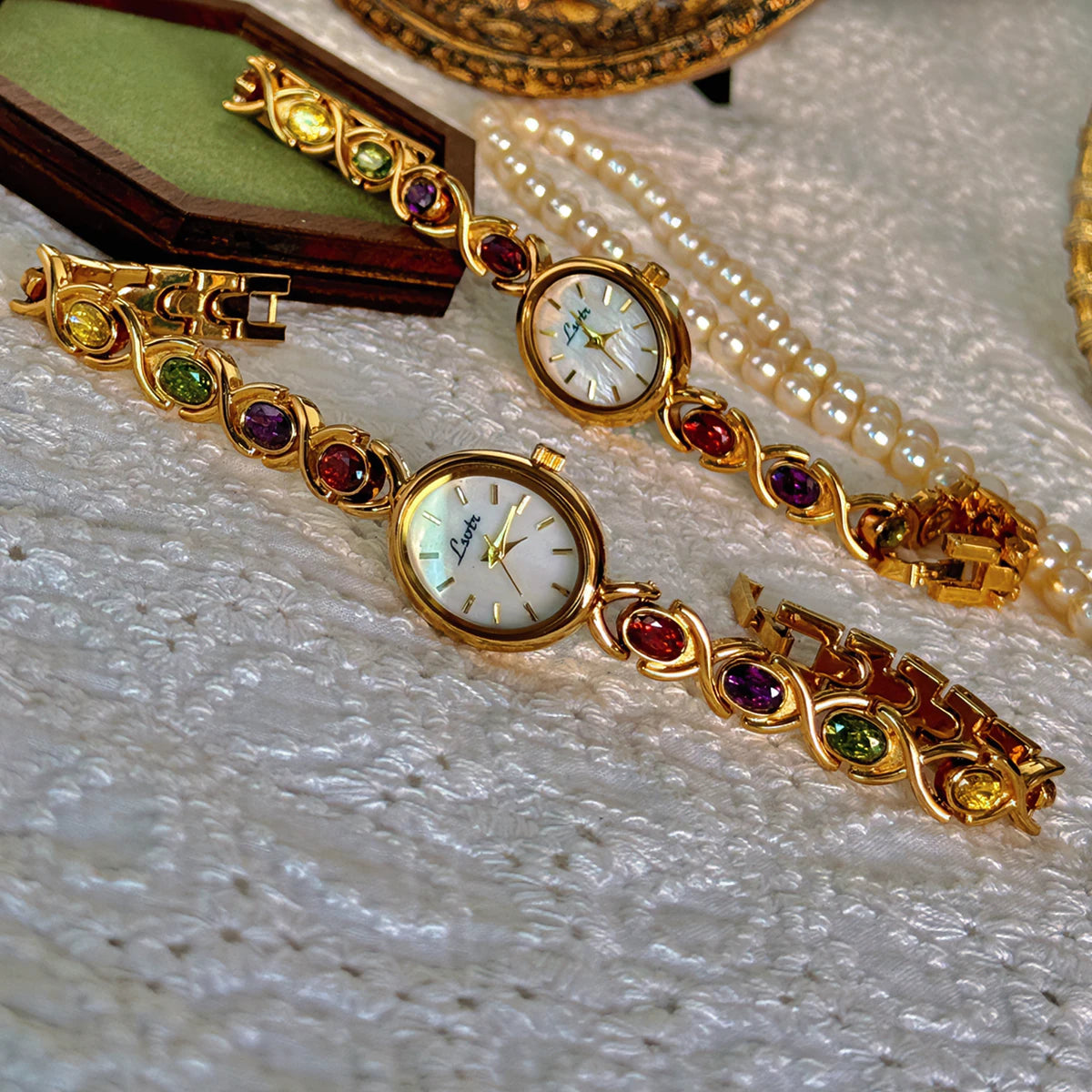 1Pc New High-End Luxury Women'S Watch Embedded with Colorful Tourmalines, Diamonds and an Oval Shaped Mother of Pearl Dial.